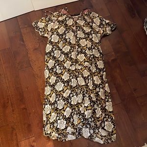 Brown, yellow, and white floral dress.